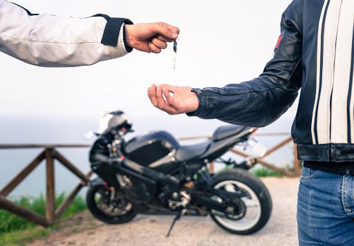 Key Exchange Motorcycle Concept Friends Exchanging The Bike Key